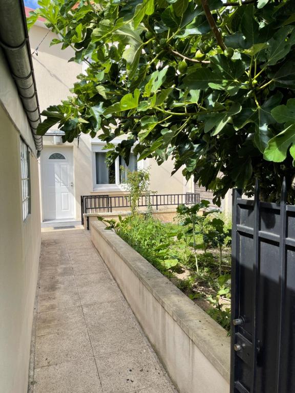 Zahrada ubytování Maison Hotel proche Paris et Orly