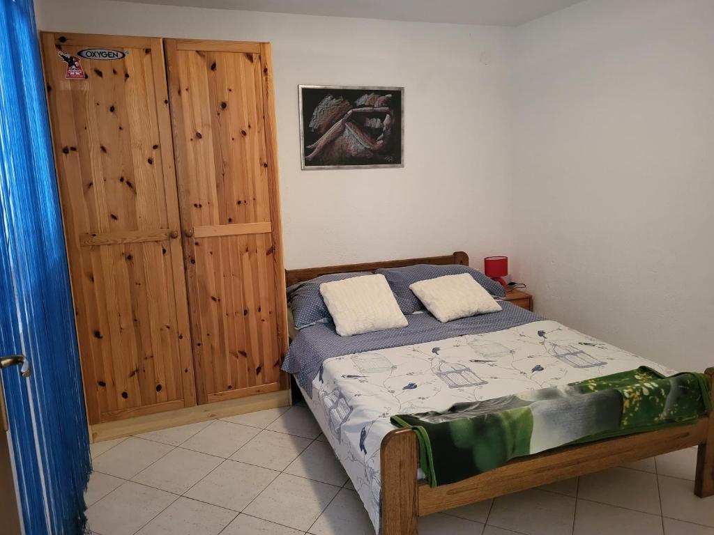 Säng eller sängar i ett rum på Apartments Mašić