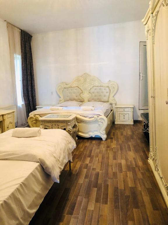 Postel nebo postele na pokoji v ubytování Old Rabati