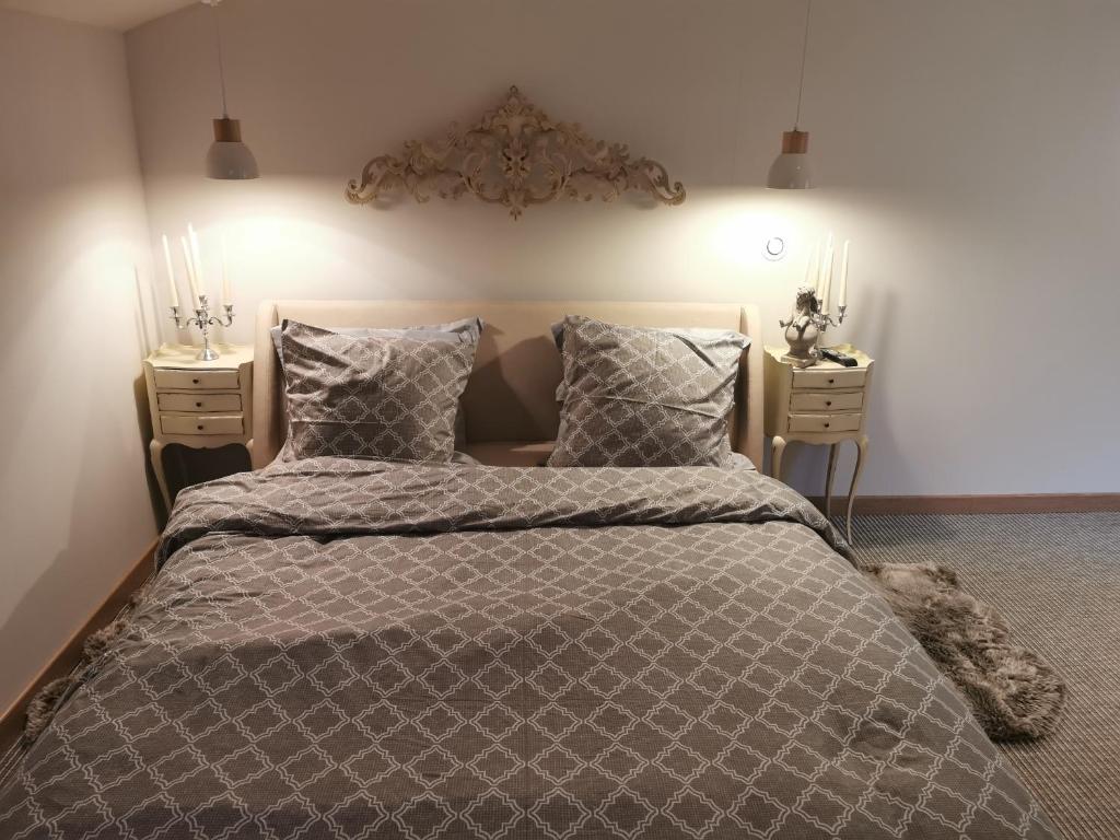 Posteľ alebo postele v izbe v ubytovaní Au domaine de Gigie