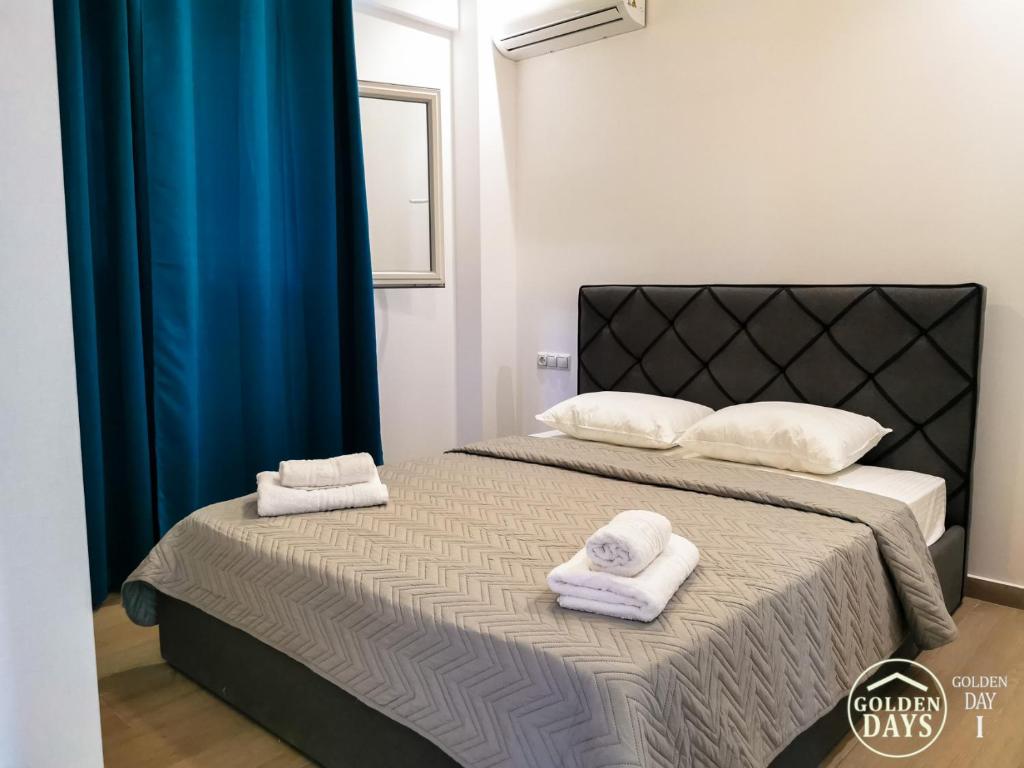 Postel nebo postele na pokoji v ubytování Golden Days villas