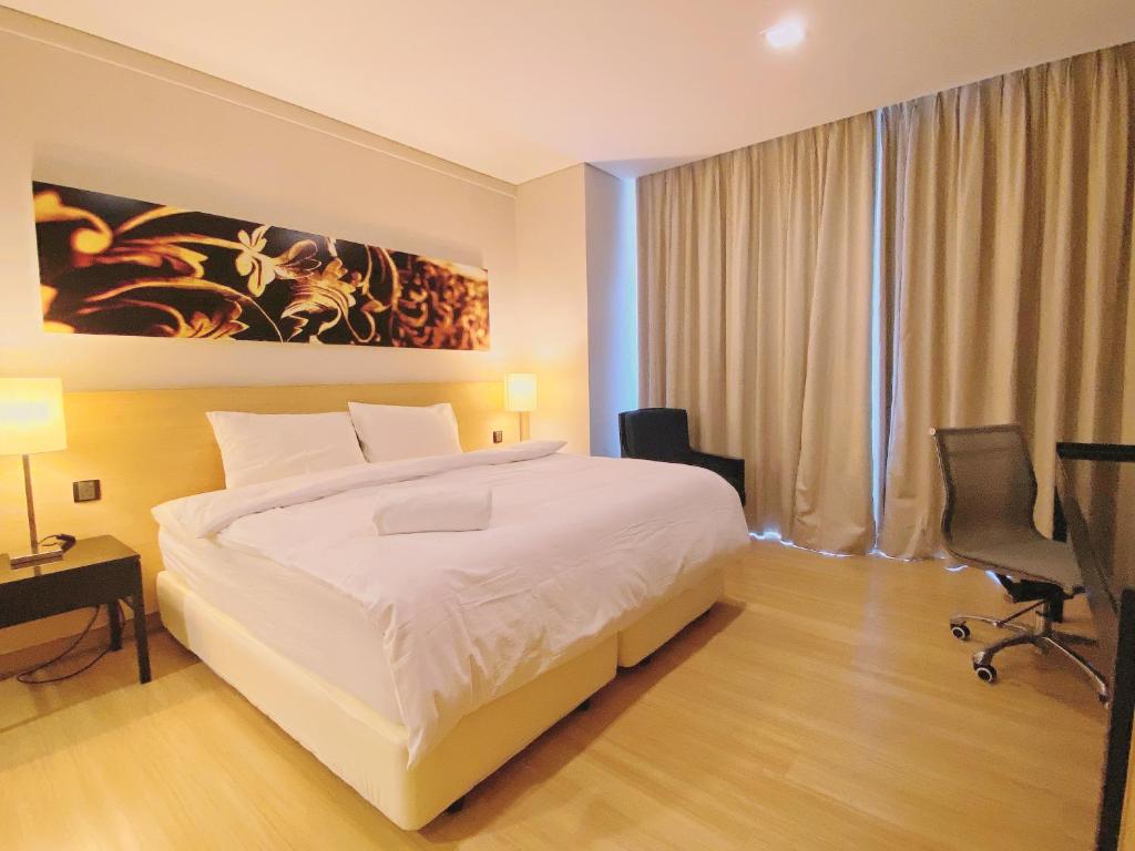 Postel nebo postele na pokoji v ubytování Straits Suite by C Homestay Malacca