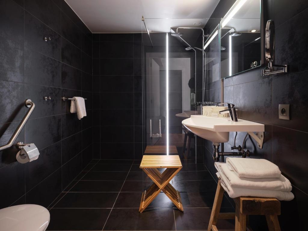 Koupelna v ubytování Le 24 Hotel