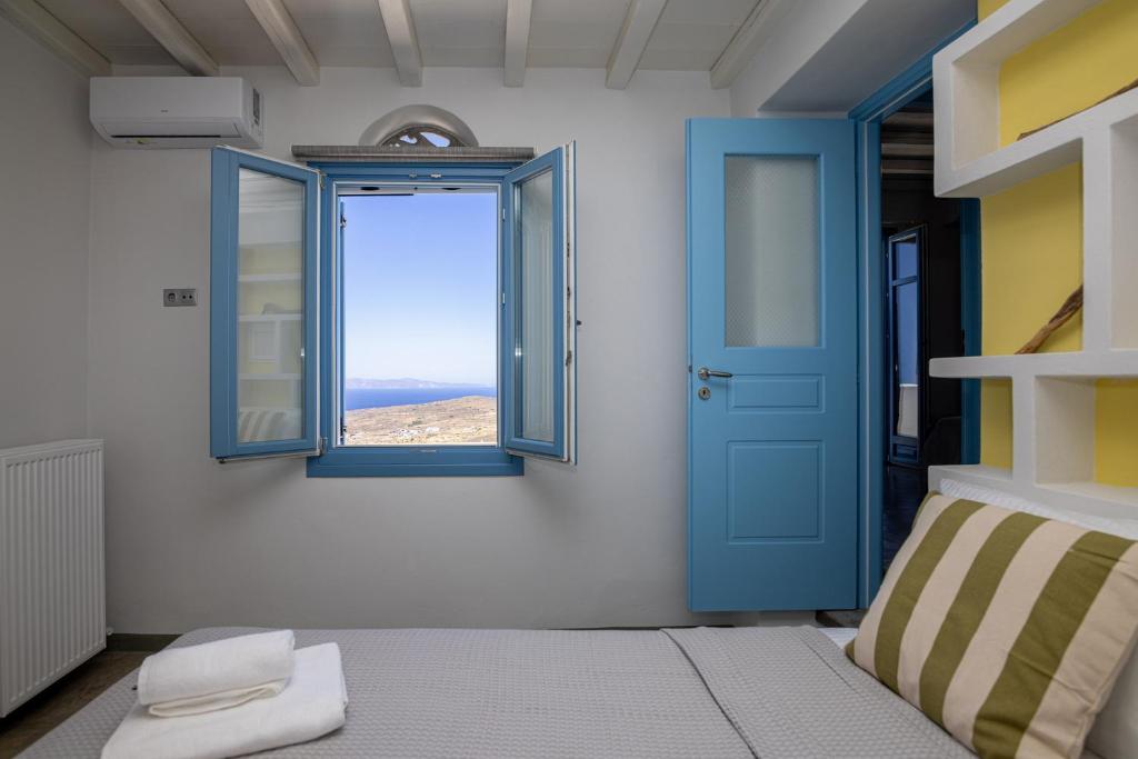 Postel nebo postele na pokoji v ubytování Aegean Muses