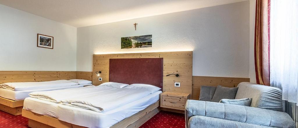Postel nebo postele na pokoji v ubytování B&B Apartments La Palsa