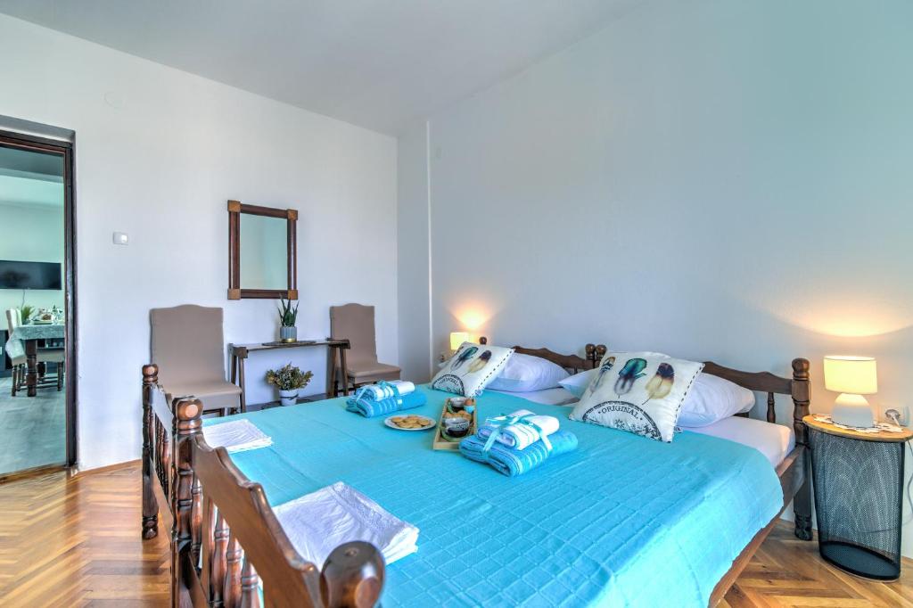 Postel nebo postele na pokoji v ubytování Apartman More