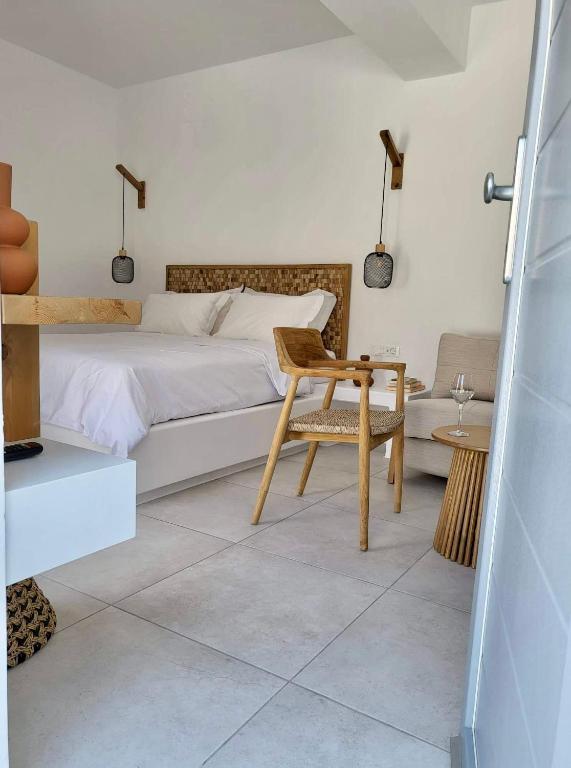 Postel nebo postele na pokoji v ubytování Agnantema luxury suites