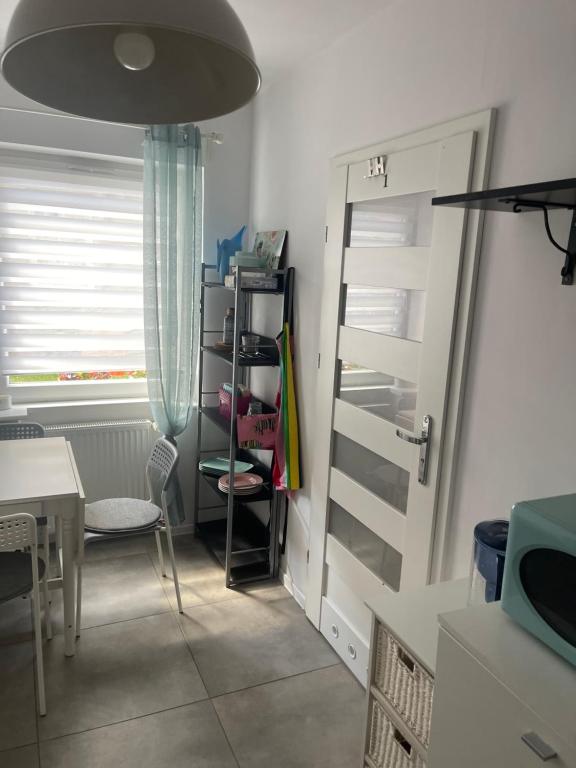 Posteľ alebo postele v izbe v ubytovaní Apartament Słoneczna Oliwa