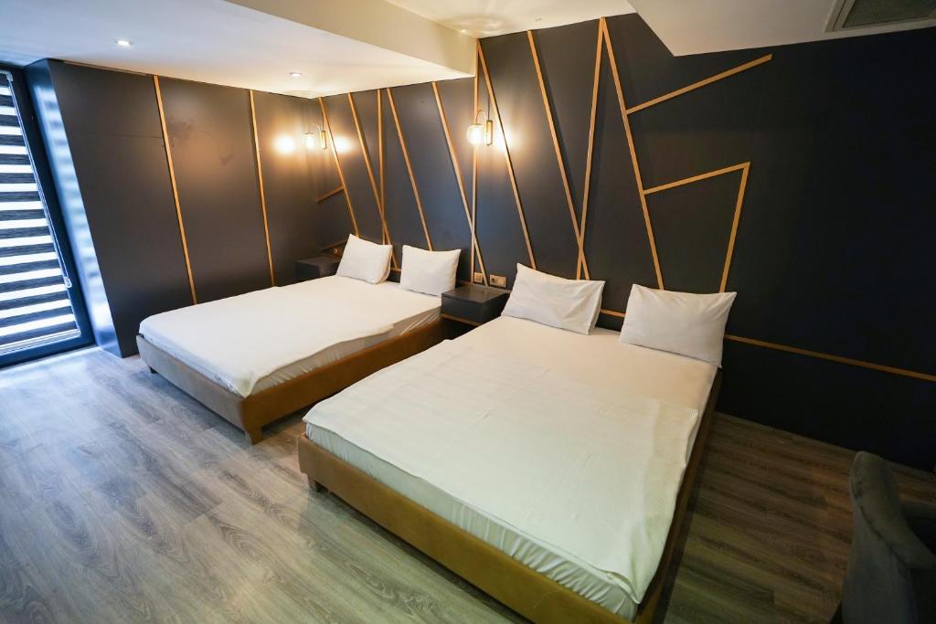 A bed or beds in a room at Time Hotel Mecidiyekoy