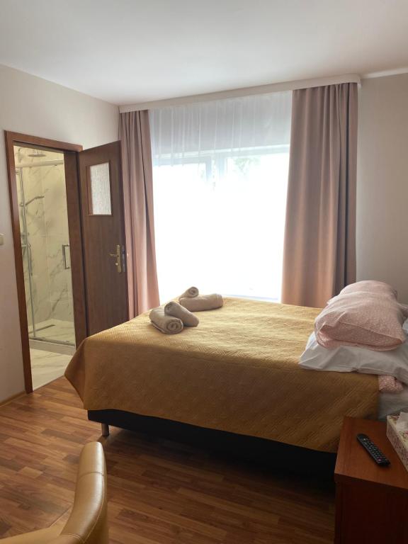 Posteľ alebo postele v izbe v ubytovaní Willa Magnolia