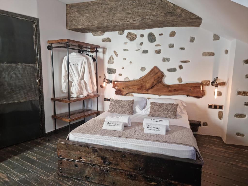Postel nebo postele na pokoji v ubytování ONAR LUXURIES