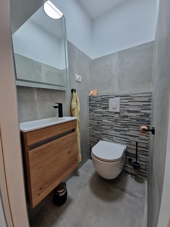 Kúpeľňa v ubytovaní Apartment Cvita in city center