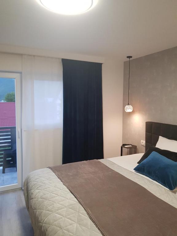 Posteľ alebo postele v izbe v ubytovaní Rooms Vanteo