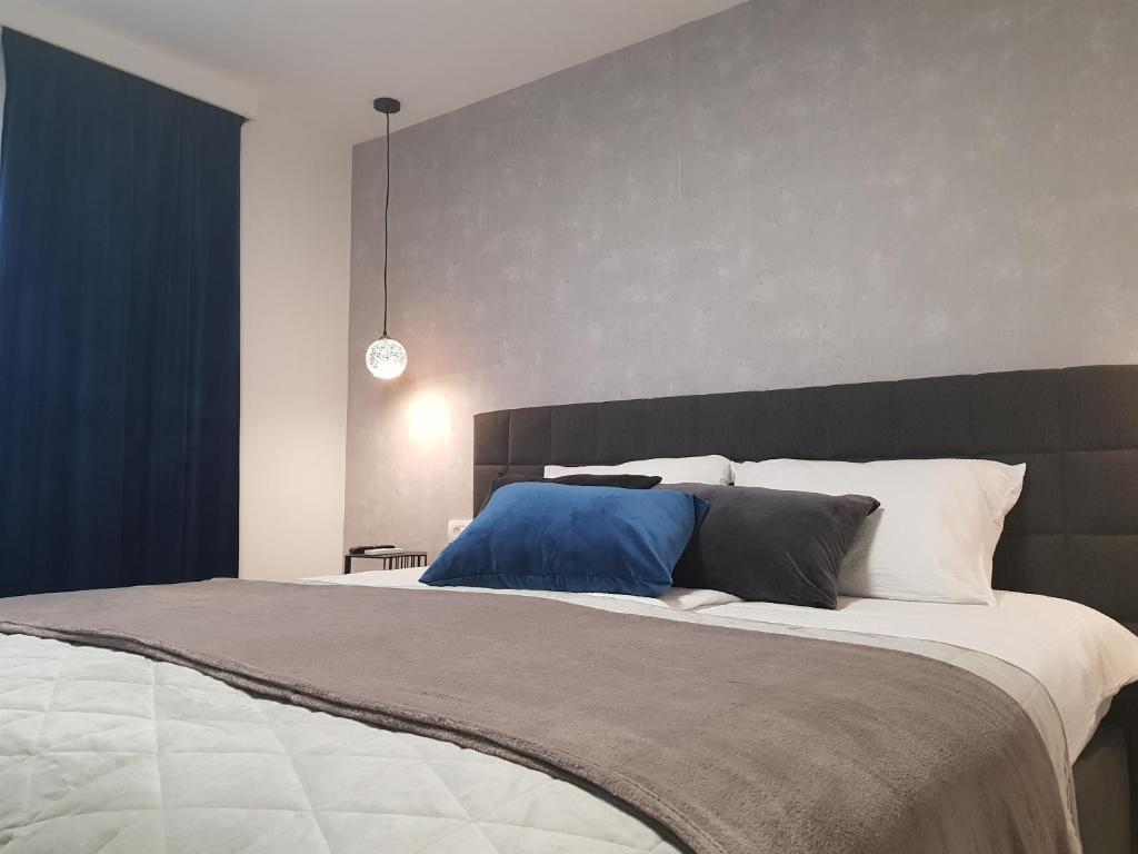 Posteľ alebo postele v izbe v ubytovaní Rooms Vanteo