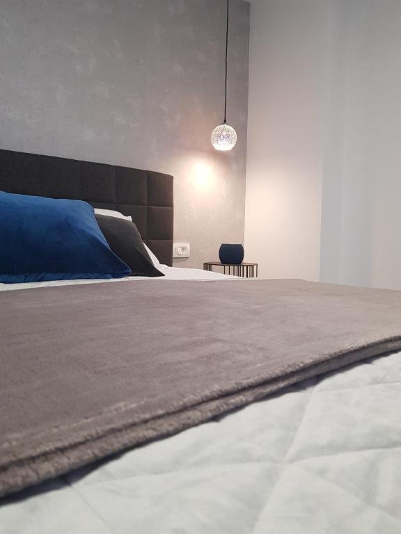 Posteľ alebo postele v izbe v ubytovaní Rooms Vanteo