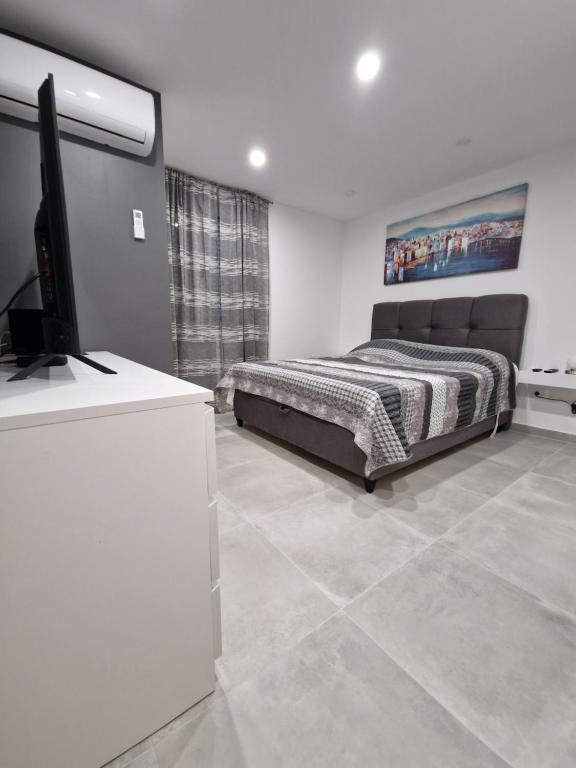 Posteľ alebo postele v izbe v ubytovaní Apartment Cvita in city center