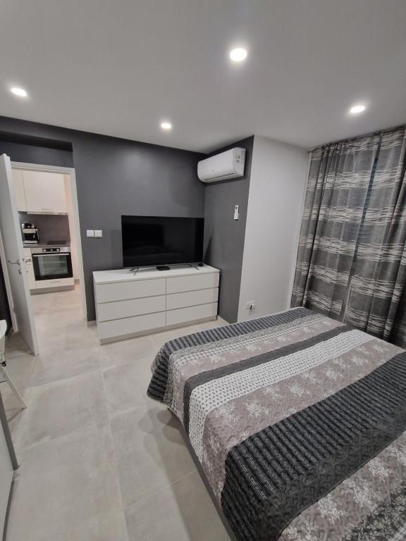 Posteľ alebo postele v izbe v ubytovaní Apartment Cvita in city center