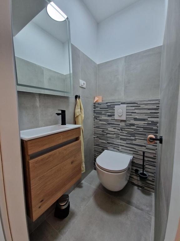 Kúpeľňa v ubytovaní Apartment Cvita in city center