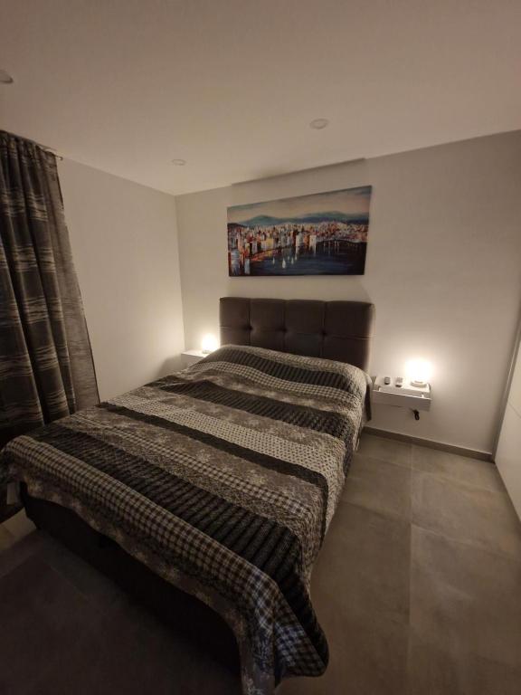 Posteľ alebo postele v izbe v ubytovaní Apartment Cvita in city center