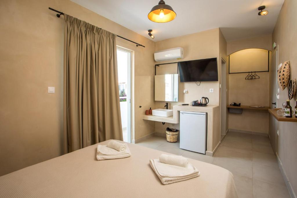 Kuchyň nebo kuchyňský kout v ubytování Atma Beach Rooms & Suites