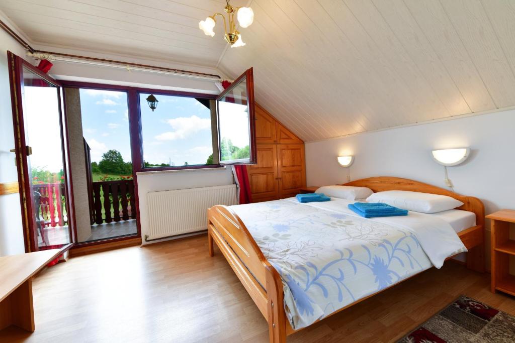 Posteľ alebo postele v izbe v ubytovaní Guesthouse Ante Hodak