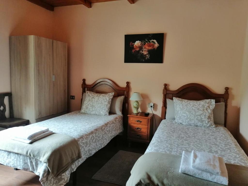 Postel nebo postele na pokoji v ubytování Casa Licerio