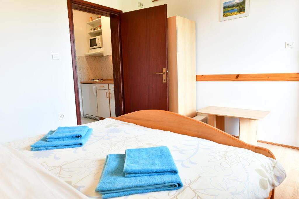 Posteľ alebo postele v izbe v ubytovaní Guesthouse Ante Hodak