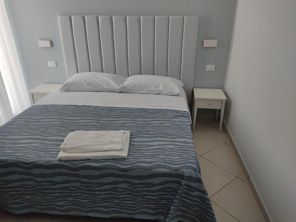 Postel nebo postele na pokoji v ubytování Hotel Caravel Park