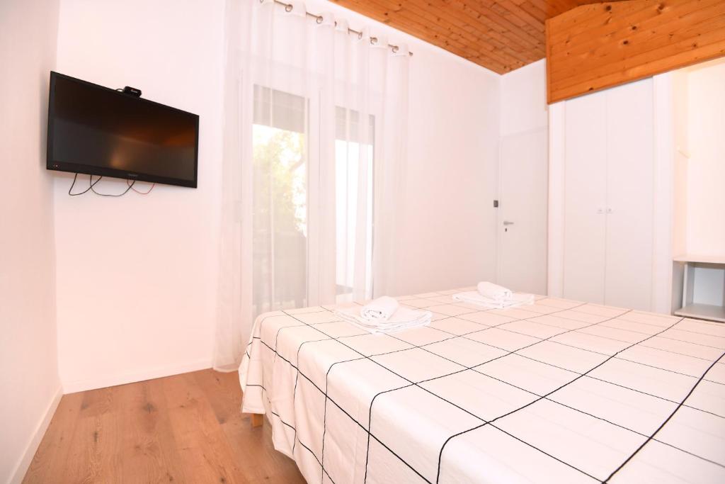 Posteľ alebo postele v izbe v ubytovaní Apartment by the sea Renata in Punta Skala