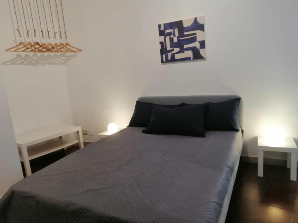 A bed or beds in a room at 100 PASSI Politeama