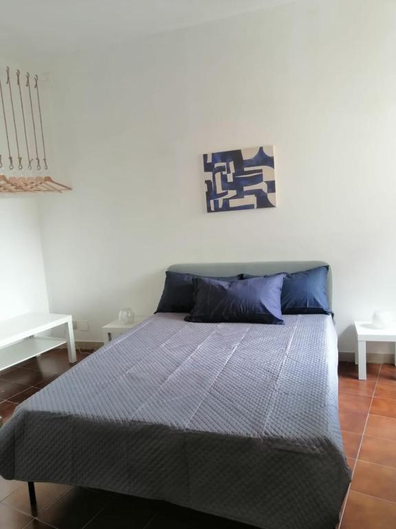 A bed or beds in a room at 100 PASSI Politeama
