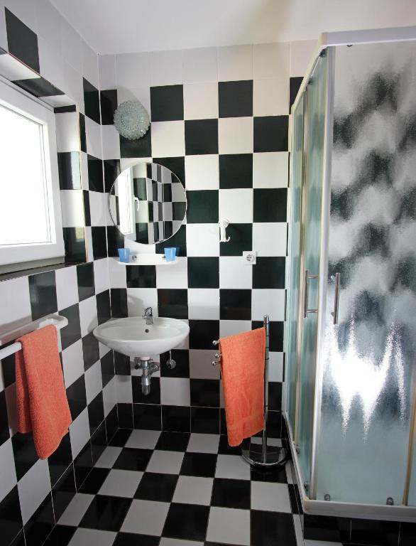 Koupelna v ubytování Guesthouse Garni