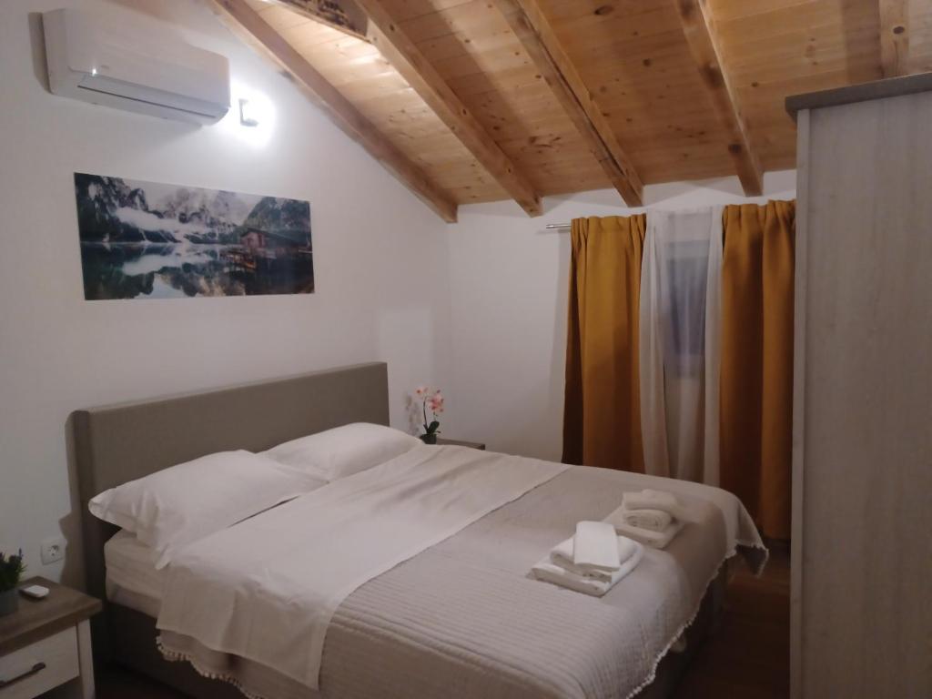 Posteľ alebo postele v izbe v ubytovaní Vila David