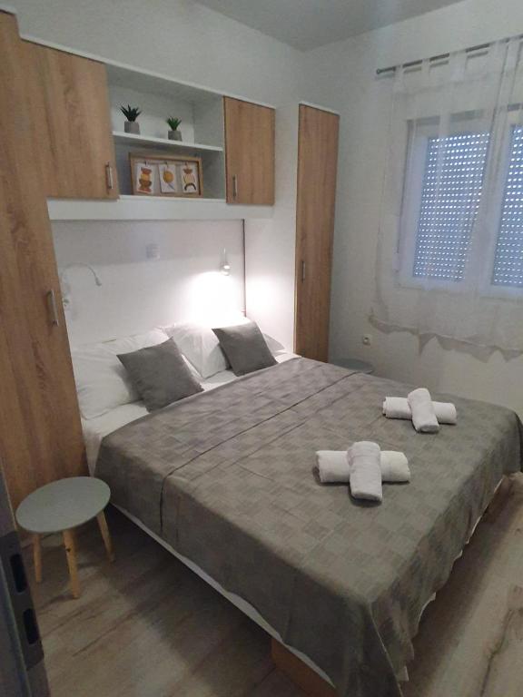 Posteľ alebo postele v izbe v ubytovaní Apartments MENA