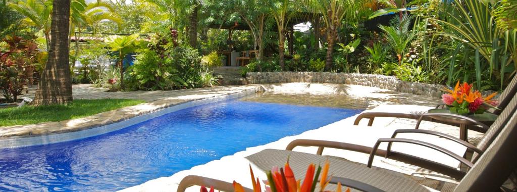 Бассейн в Villas Oasis или поблизости