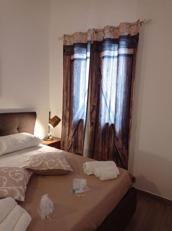 Postel nebo postele na pokoji v ubytování Casa vacanze Pupo centro storico