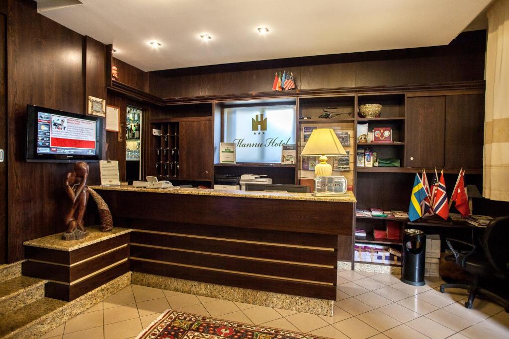TV a/nebo společenská místnost v ubytování Mannu Hotel