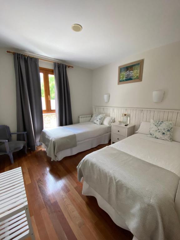 Postel nebo postele na pokoji v ubytování Hotel Casa Socotor