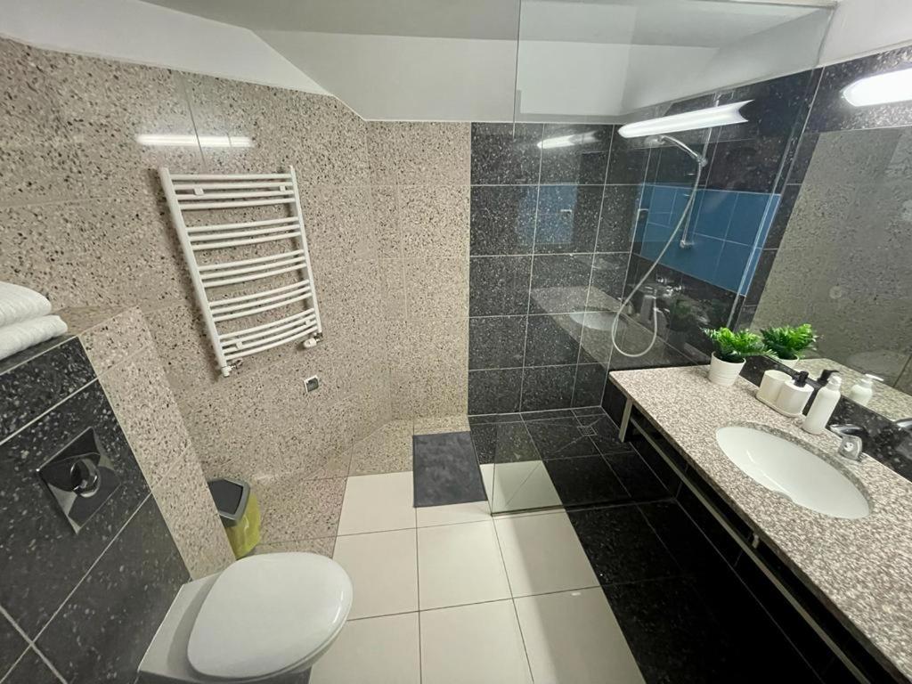 Koupelna v ubytování Apartamenty Residence Borkowo