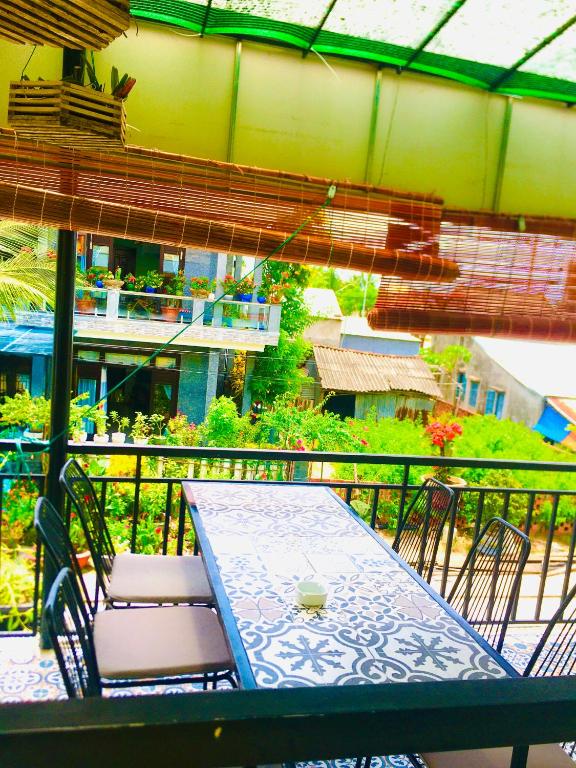 Balkón nebo terasa v ubytování An Bang Sea Adventure Homestay Hoi An