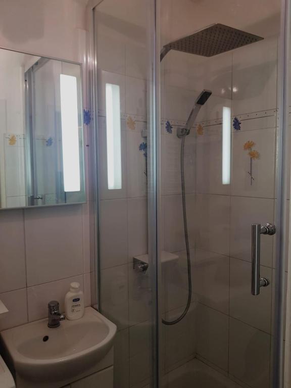 Kúpeľňa v ubytovaní Apartament Plac Trzech Krzyży