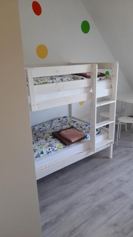 Postel nebo postele na pokoji v ubytování Dům Jenišov