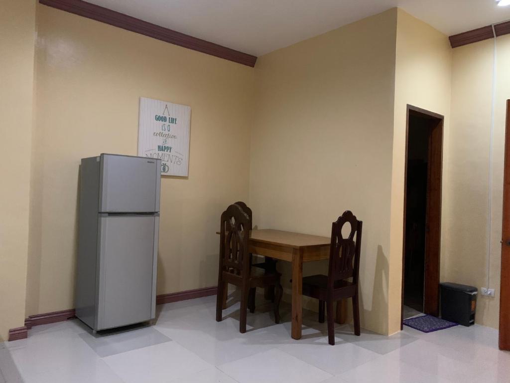 Kuchyň nebo kuchyňský kout v ubytování Mabini Hotel