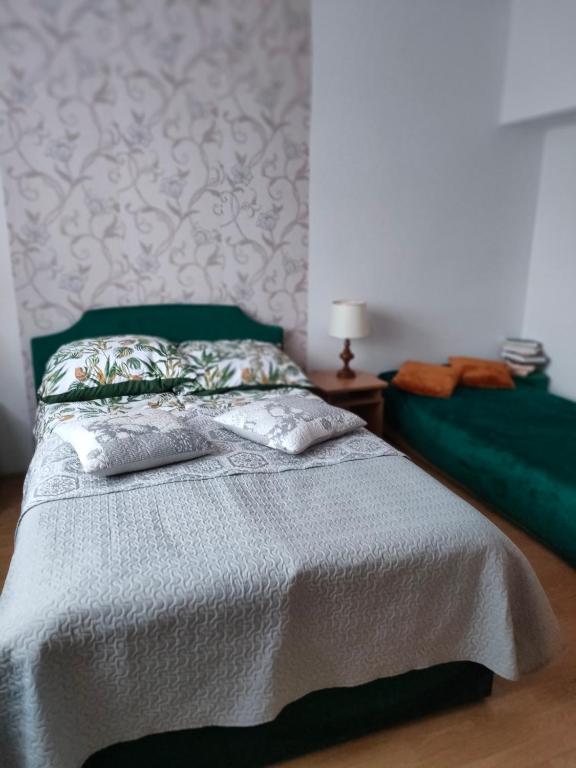 Postel nebo postele na pokoji v ubytování Agrogospodarstwo HALINA ŁUC