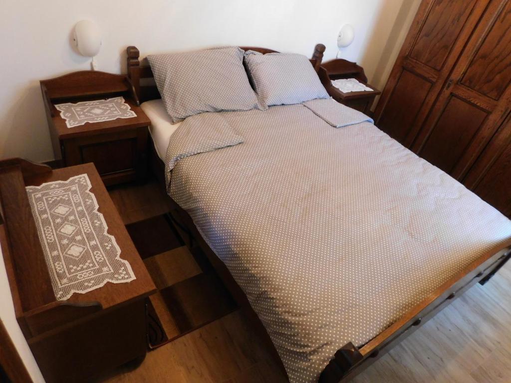 Postel nebo postele na pokoji v ubytování Kamnita hiša Stari klesar