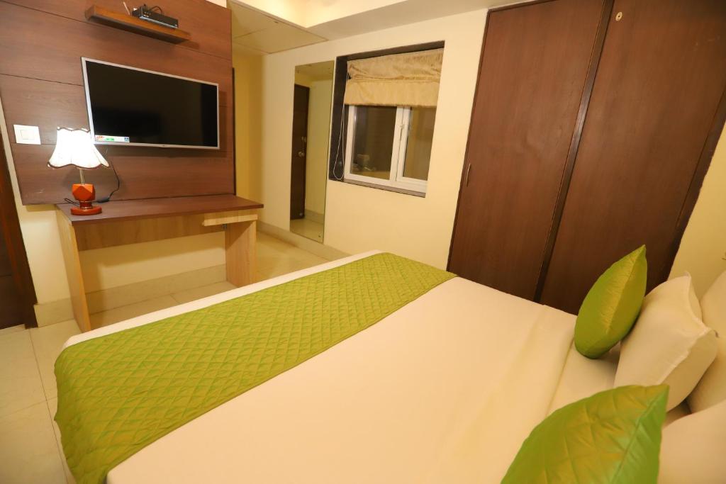 Postel nebo postele na pokoji v ubytování Hotel Mayur Assam - New Delhi Railway Station
