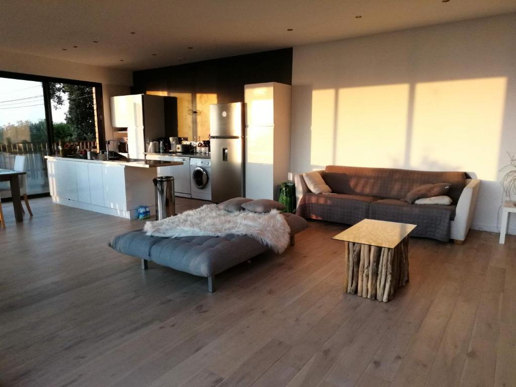 Posedenie v ubytovaní Villa l'Alpana en bois vue mer a 180 degres