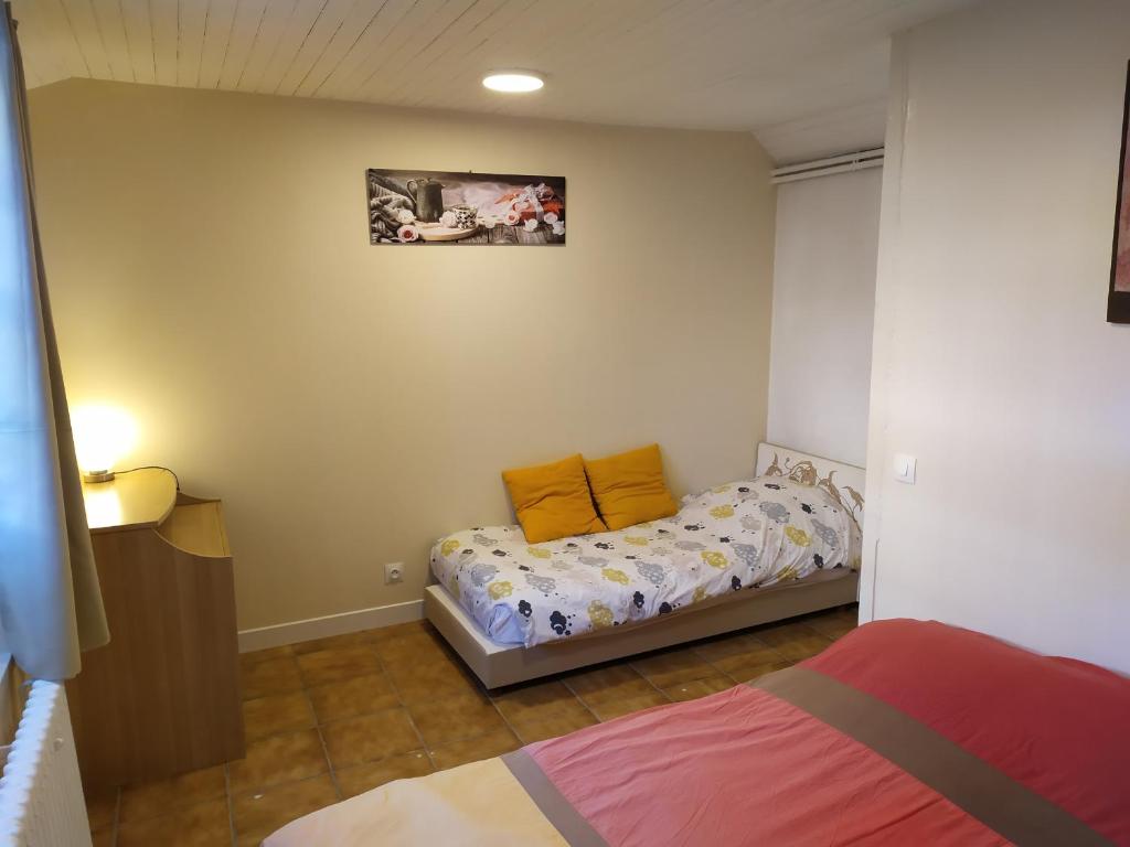 Posteľ alebo postele v izbe v ubytovaní Gîtes "La Sérénité Marivaloise"