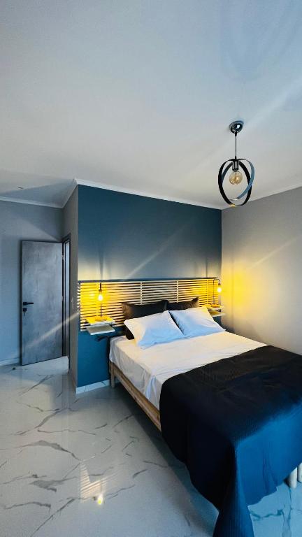 Postel nebo postele na pokoji v ubytování Thalistris Room