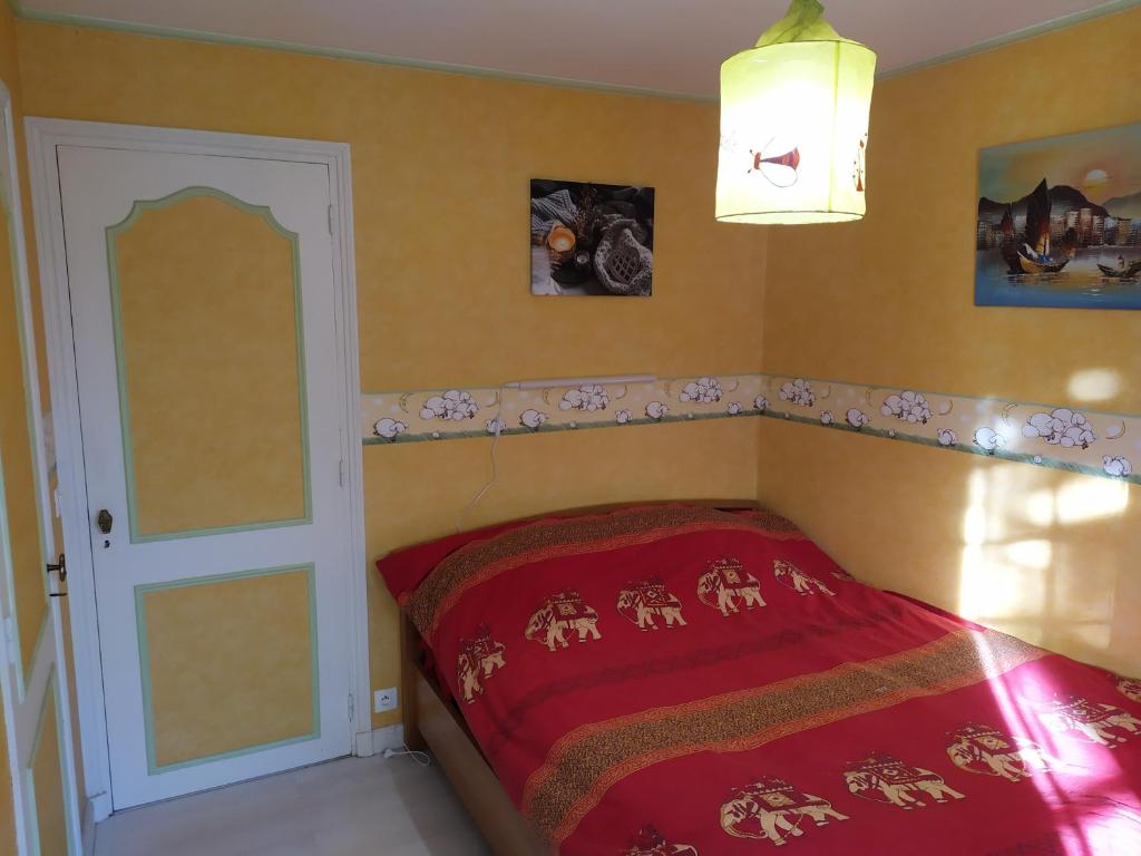 Posteľ alebo postele v izbe v ubytovaní Gîtes "La Sérénité Marivaloise"